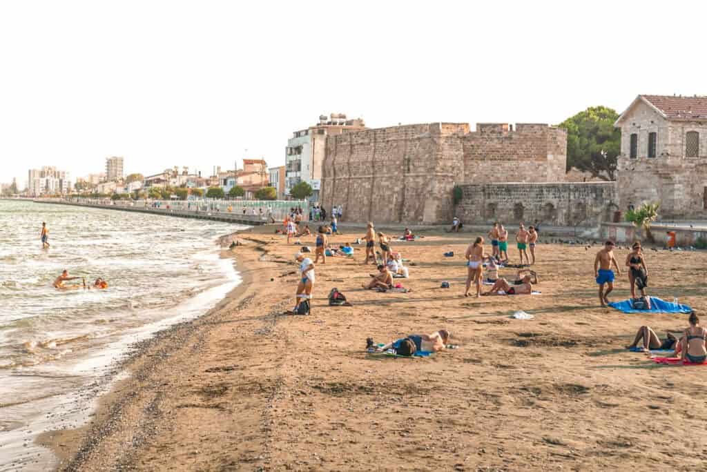 people on lanarca beach cyprus