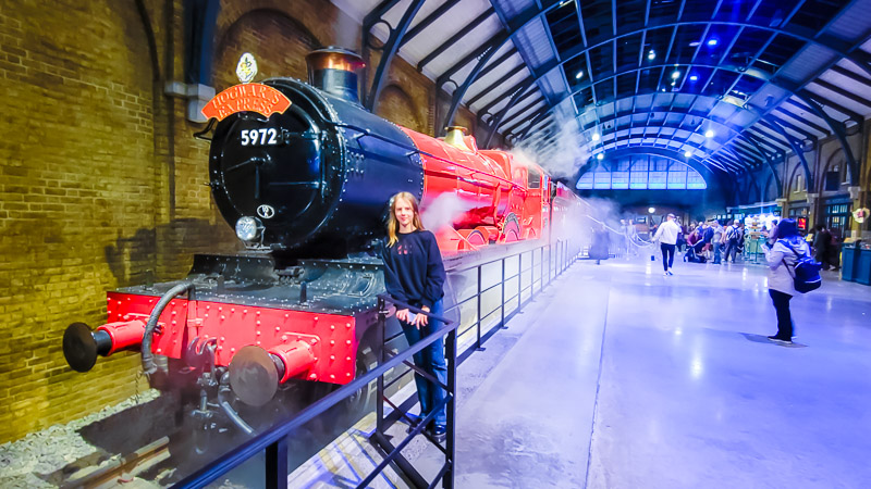 girl in front of train at harry potter studios tour london-04