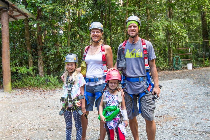 family posing in harness in the jungle surfing Daintree Rainforest