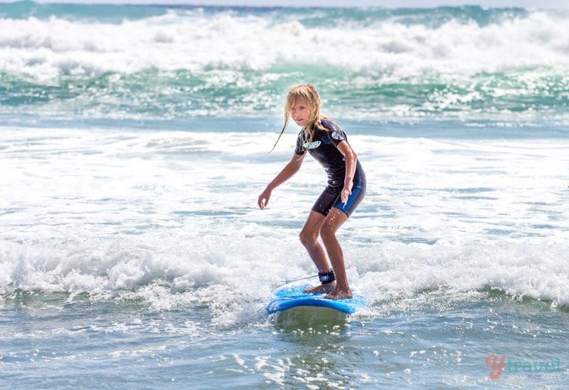 girl learning to surf gold coast