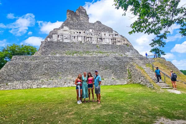 family in front of el castillo at Xunantunich