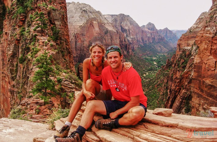 couple posing on angels landing  zion national park utah